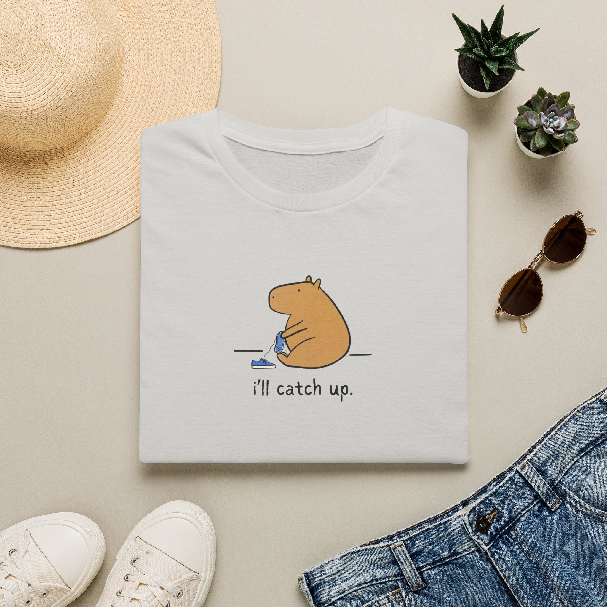 Capy Life softstyle t-shirt featuring a minimalist capybara illustration with the text i'll catch up on a white tee.