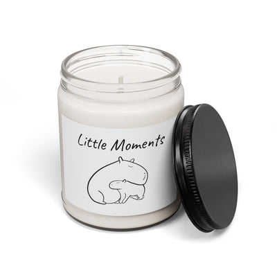 Capy Life minimalist soy wax candle in a glass jar with a black lid and a capybara illustration label.
