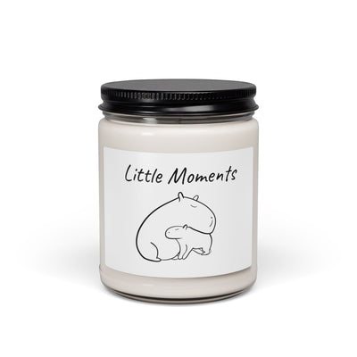 Capy Life passionfruit scent soy wax candle in a glass jar with a minimalist label featuring a capybara and baby illustration.