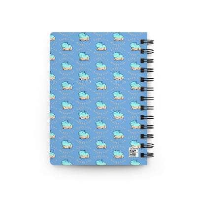 Capy Life spiral notebook featuring a repeating coastal capybara pattern on a calming blue background.