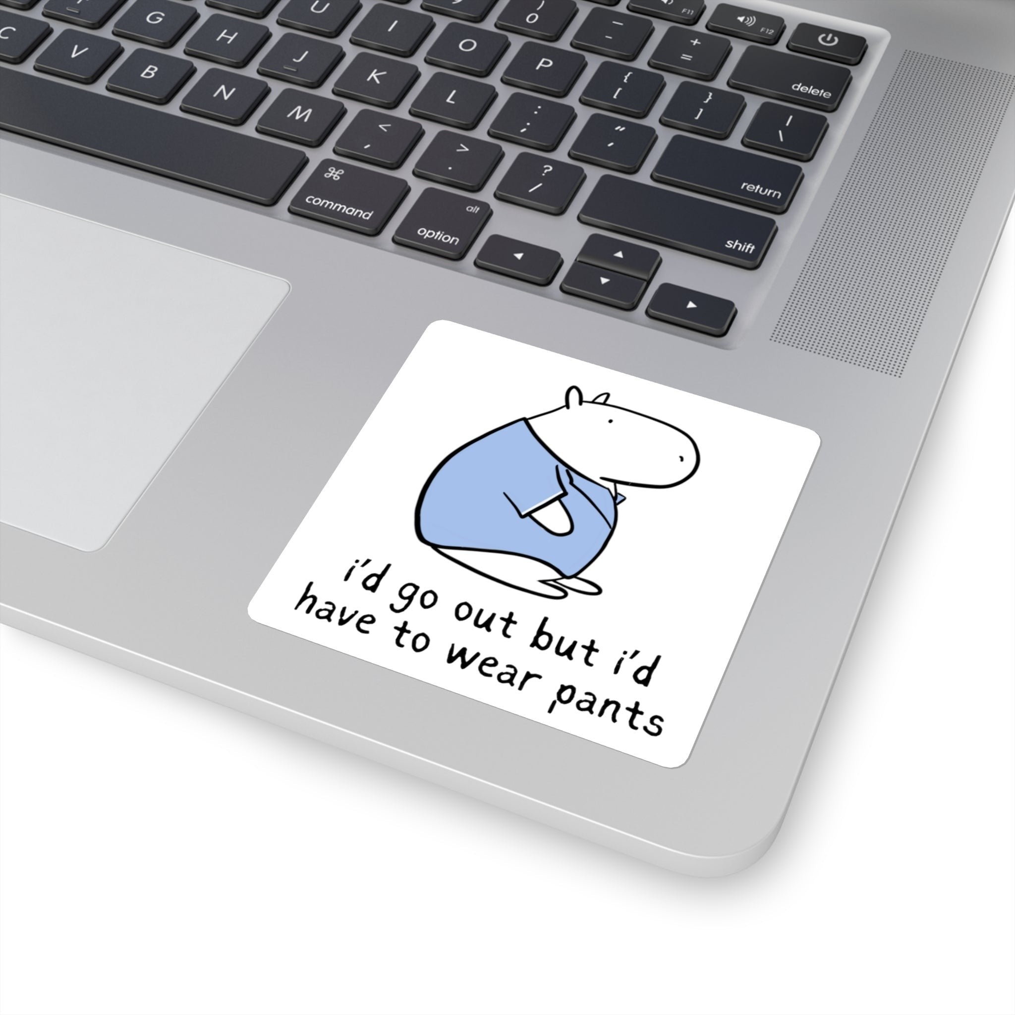 Capy Life vinyl sticker on a laptop featuring a capybara in a blue shirt with the text I’d go out but I’d have to wear pants