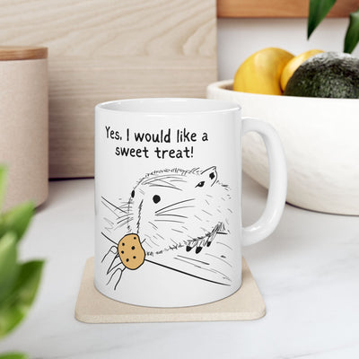 Capy Life white ceramic mug featuring a hand-drawn capybara illustration and the text Yes, I would like a sweet treat