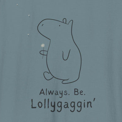 Capy Life Comfort Colors tank top in blue with a minimalist line drawing of Gene the Capybara holding a dandelion.