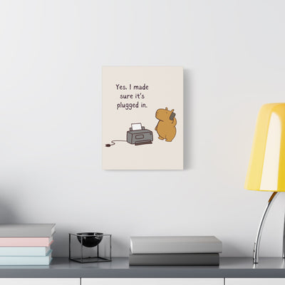Capy Life canvas wall art featuring a cute capybara on a phone next to a printer with IT humor text on a white wall.