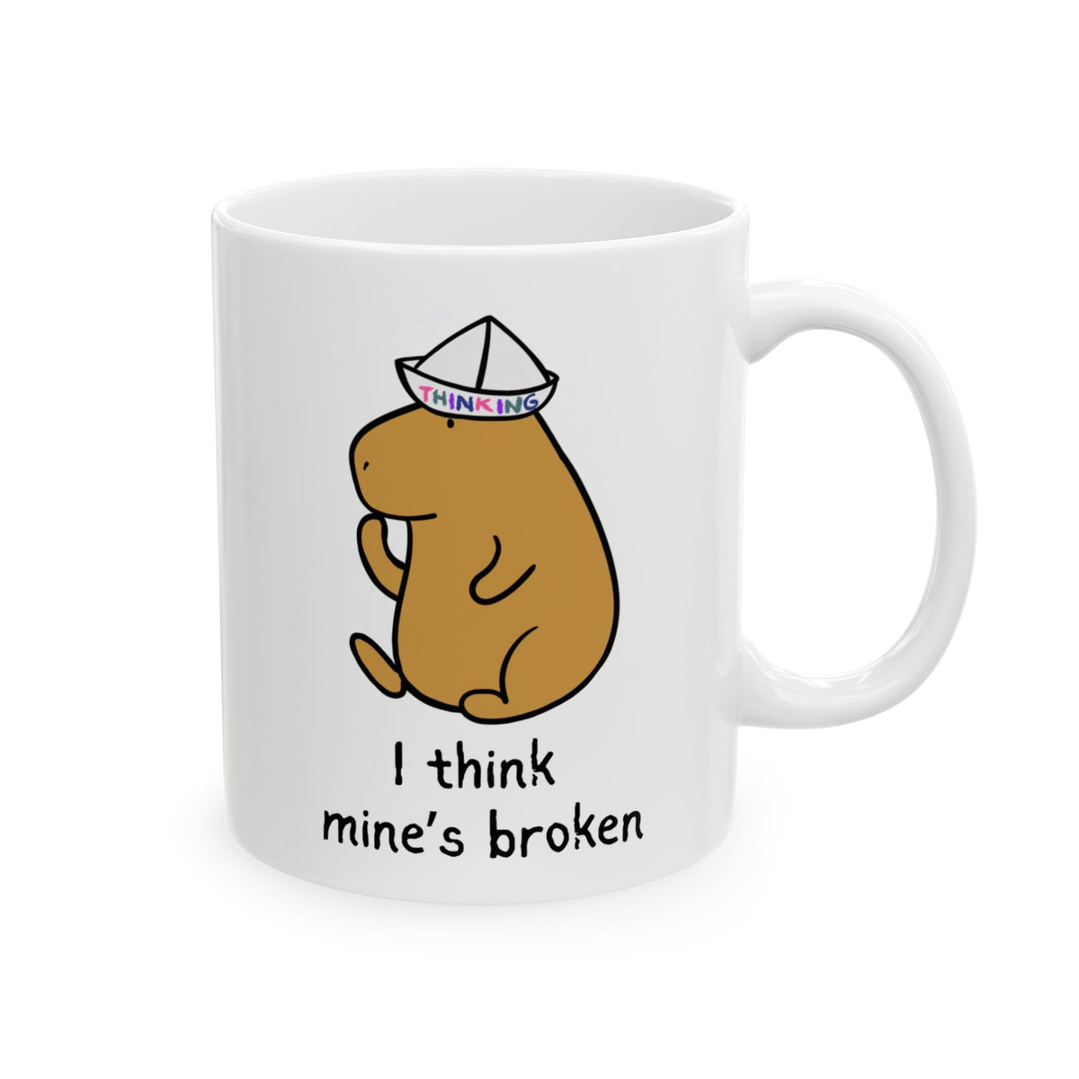 Capy Life white ceramic mug featuring a cute capybara wearing a paper thinking cap with the text I think mine is broken