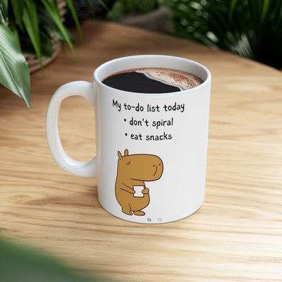 Capy Life white ceramic coffee mug featuring a cute capybara illustration with a funny to-do list checklist