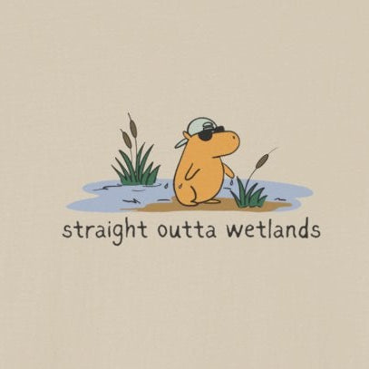Capy Life softstyle tee featuring a hand-drawn capybara in a backwards hat and sunglasses in a wetland scene.