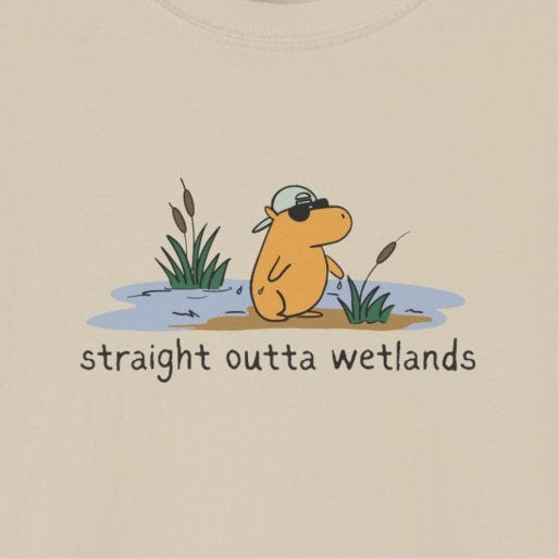 Capy Life beige softstyle t-shirt featuring a hand-drawn capybara in a backwards hat with Straight Outta Wetlands text