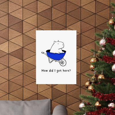Capy Life minimalist wall art print featuring a capybara in a blue wheelbarrow with the text How did I get here?