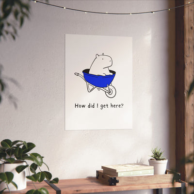 Capy Life minimalist wall art print featuring a capybara in a blue wheelbarrow with the text How did I get here?