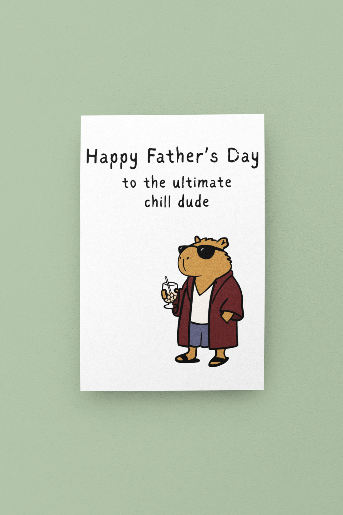 Capy Life printable Father's Day card featuring a chill capybara in a robe and sunglasses holding a cold drink.
