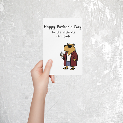 Capy Life printable Father's Day card featuring a chill capybara in sunglasses, robe, and sandals holding a drink.