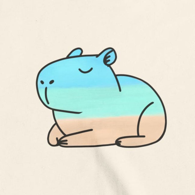 Capy Life kids t-shirt featuring a hand-painted style capybara graphic in soft blue, teal, and sand coastal colors.