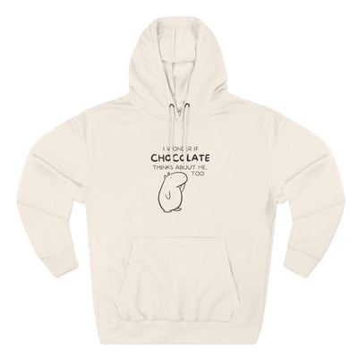 Capy Life premium hoodie in cream featuring Gene the Capybara line art and I wonder if chocolate thinks about me too