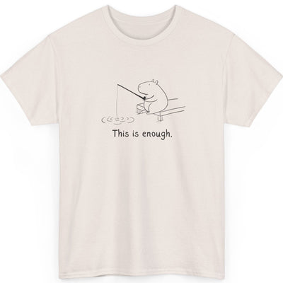 Capy Life cream heavy cotton t-shirt featuring a minimalist black line drawing of a capybara fishing with text.