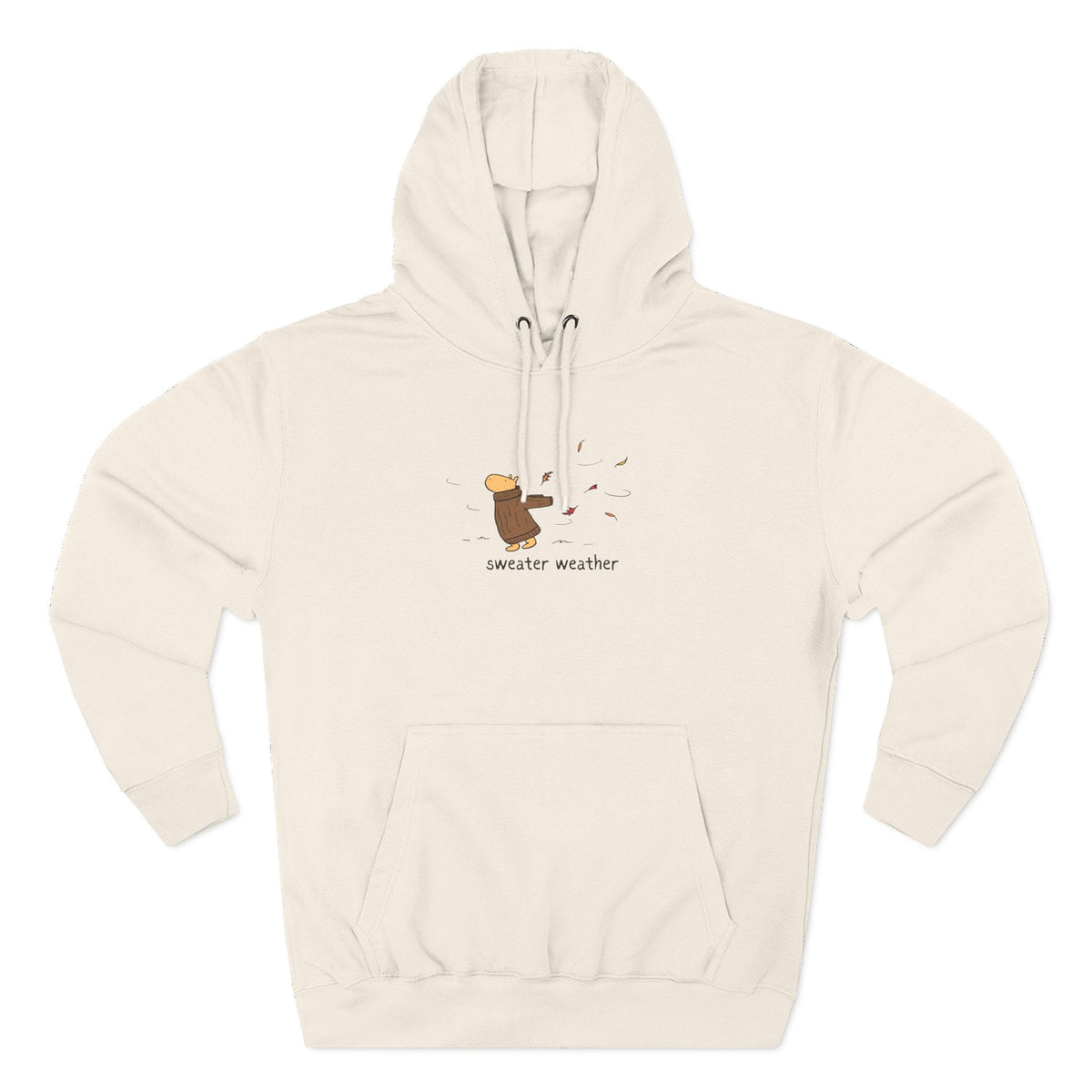 Capy Life cream fleece hoodie featuring a small graphic of Gene the capybara in a brown sweater during autumn.