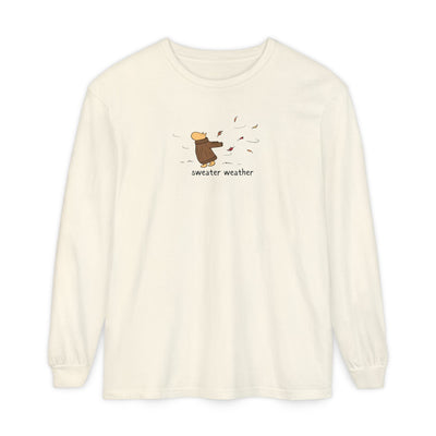 Capy Life long sleeve cream t-shirt featuring a cute capybara in a brown sweater with autumn leaves and text.