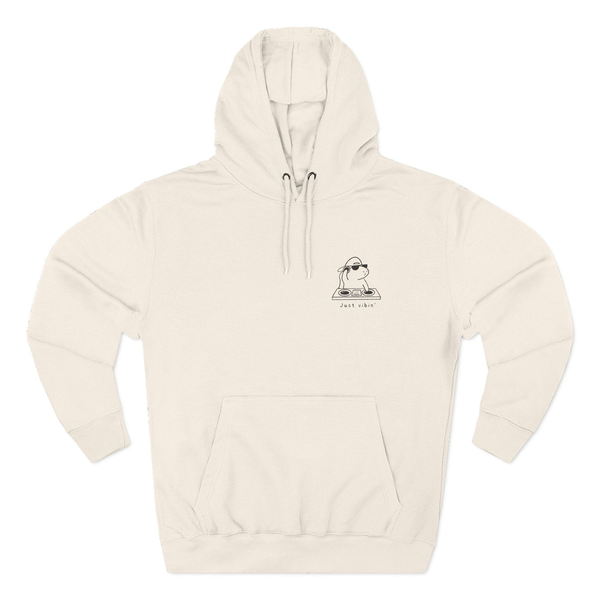 Capy Life unisex fleece hoodie in cream featuring a minimalist embroidered capybara DJ design with Just Vibin text.