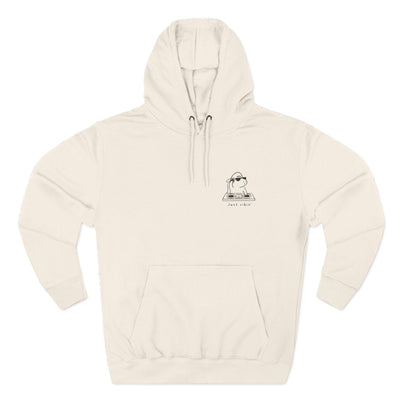 Capy Life unisex fleece hoodie in cream featuring a minimalist embroidered capybara DJ design with Just Vibin text.