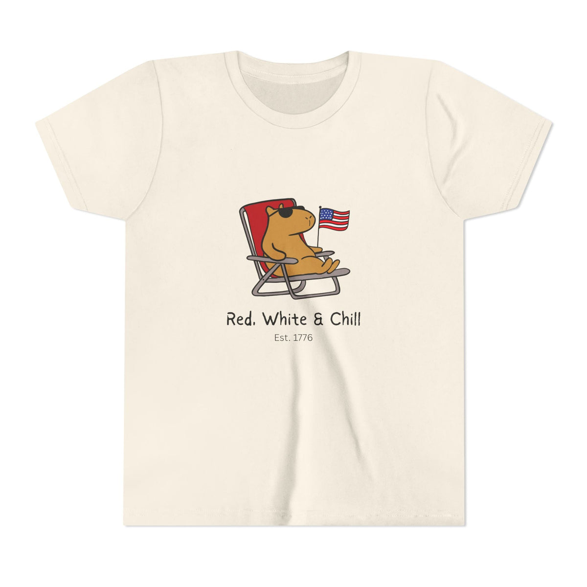 Capy Life kids cream t-shirt featuring a graphic of a capybara in sunglasses lounging with an American flag