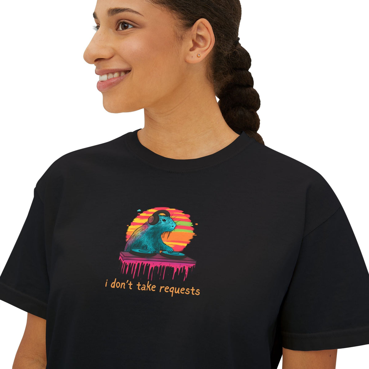 Capy Life women's black boxy t-shirt featuring a retro DJ capybara graphic with headphones and turntable art.