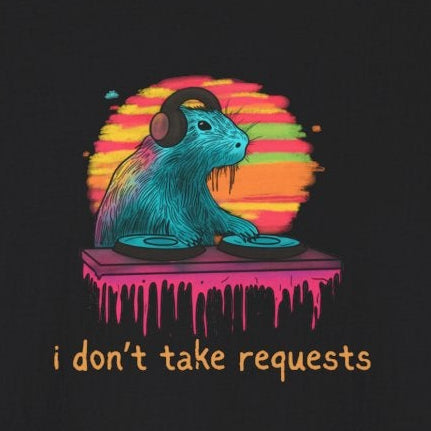 Capy Life graphic tee featuring a DJ capybara with headphones at a dripping turntable against a retro sunset background