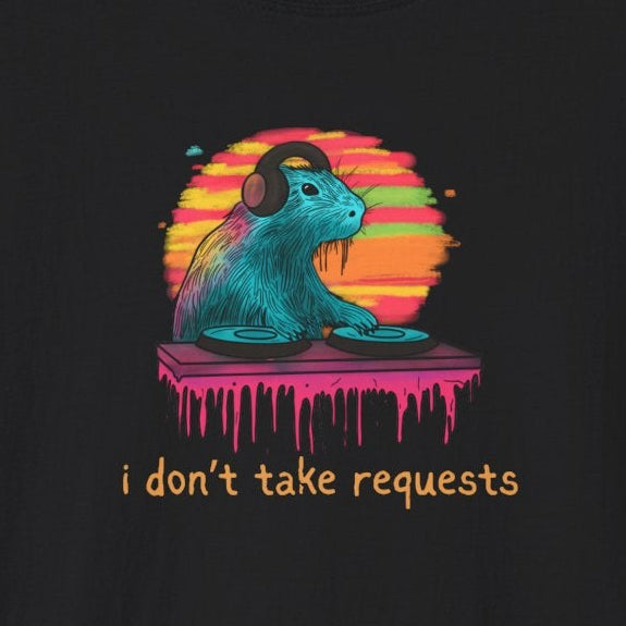 Capy Life black t-shirt featuring a colorful DJ capybara with headphones, retro sunset, and I don't take requests text