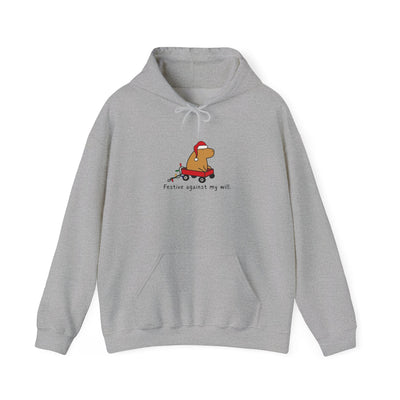 Capy Life grey hoodie featuring a capybara in a red wagon with a Santa hat and the text Festive against my will.