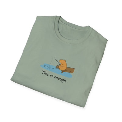 Capy Life softstyle t-shirt in sage green featuring a hand-drawn illustration of a capybara fishing on a dock.