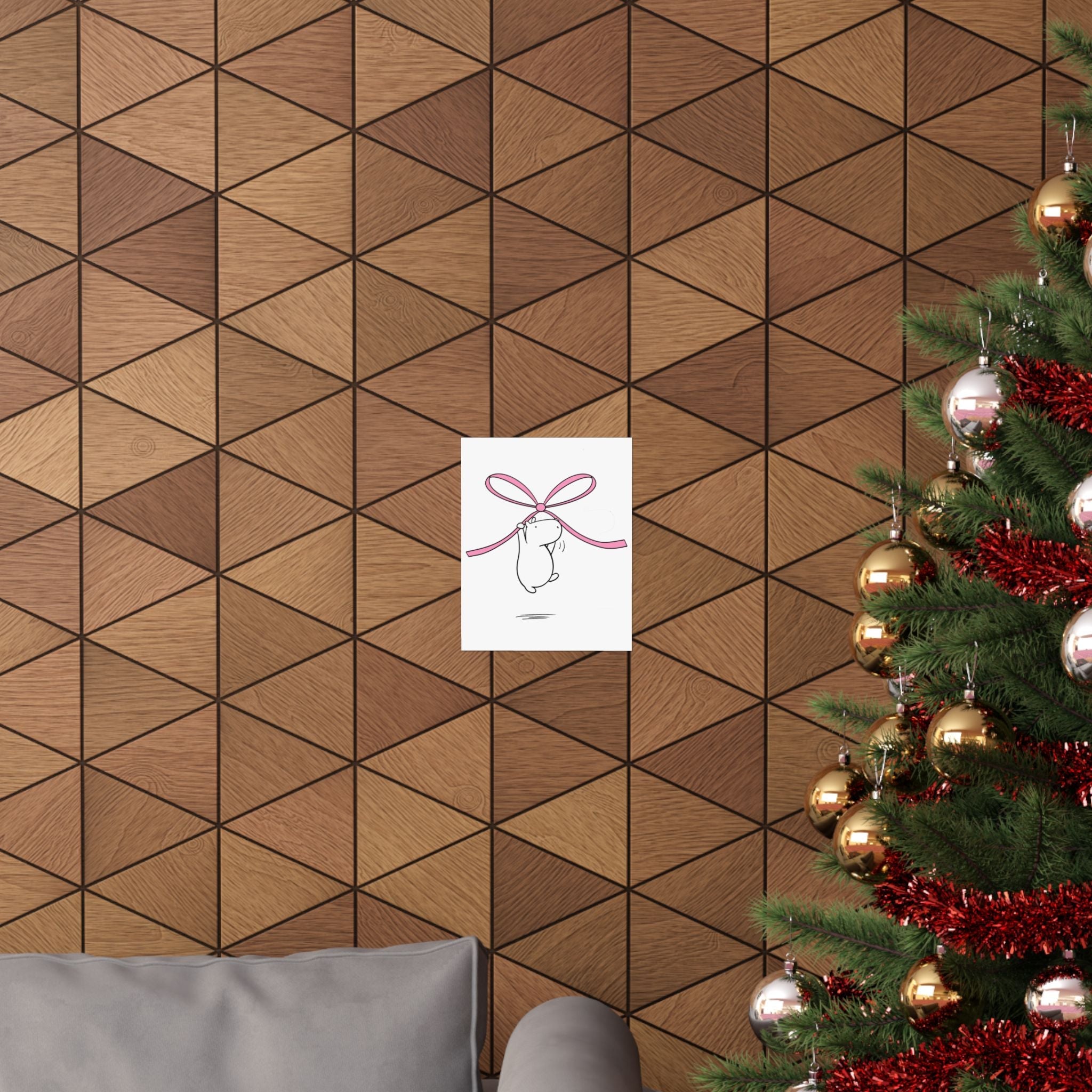 Capy Life minimalist wall art print featuring a cute capybara floating with a pink bow, displayed on a wood wall.