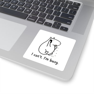 Capy Life funny capybara sticker featuring Gene on the phone eating a snack with the text I can’t. I’m busy. on a laptop.
