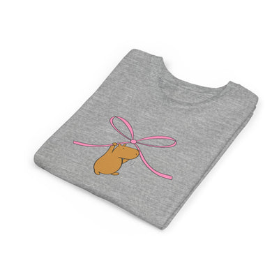 Capy Life kids grey heather graphic tee featuring a cute capybara hanging from a pink coquette bow illustration.