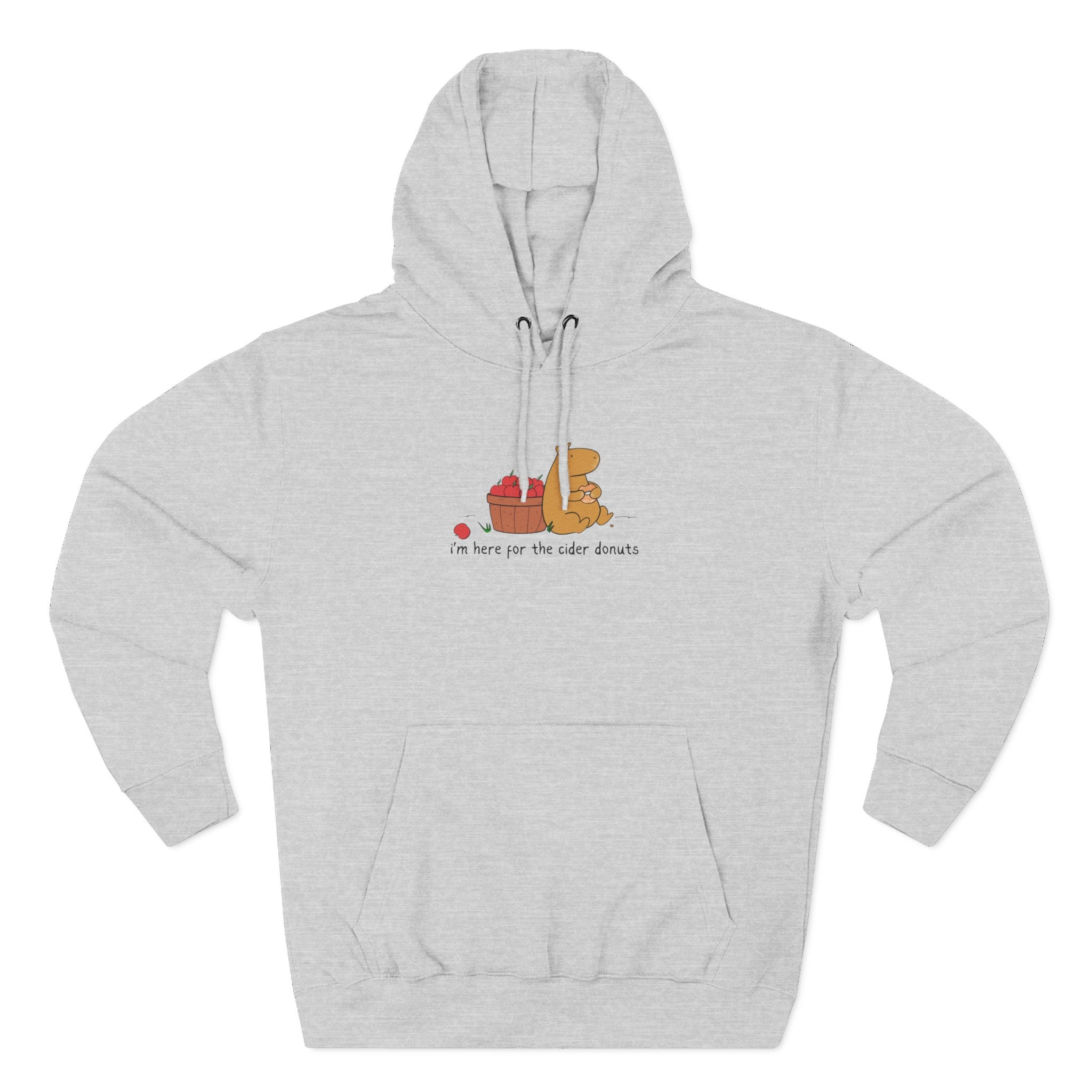 Capy Life grey fleece hoodie featuring a cute capybara eating a cider donut next to a basket of apples.