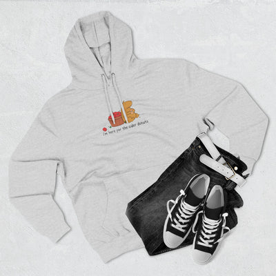 Capy Life grey fleece hoodie with a cute capybara eating a cider donut, paired with black jeans and sneakers.