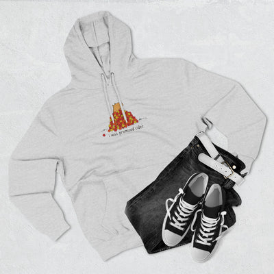 Capy Life grey fleece hoodie featuring a capybara in autumn leaves with the text I was promised cider, flat lay.