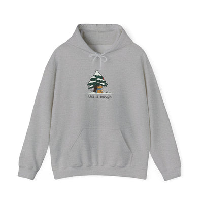 Capy Life grey pullover hoodie featuring a cute capybara illustration under a snowy tree with the text this is enough