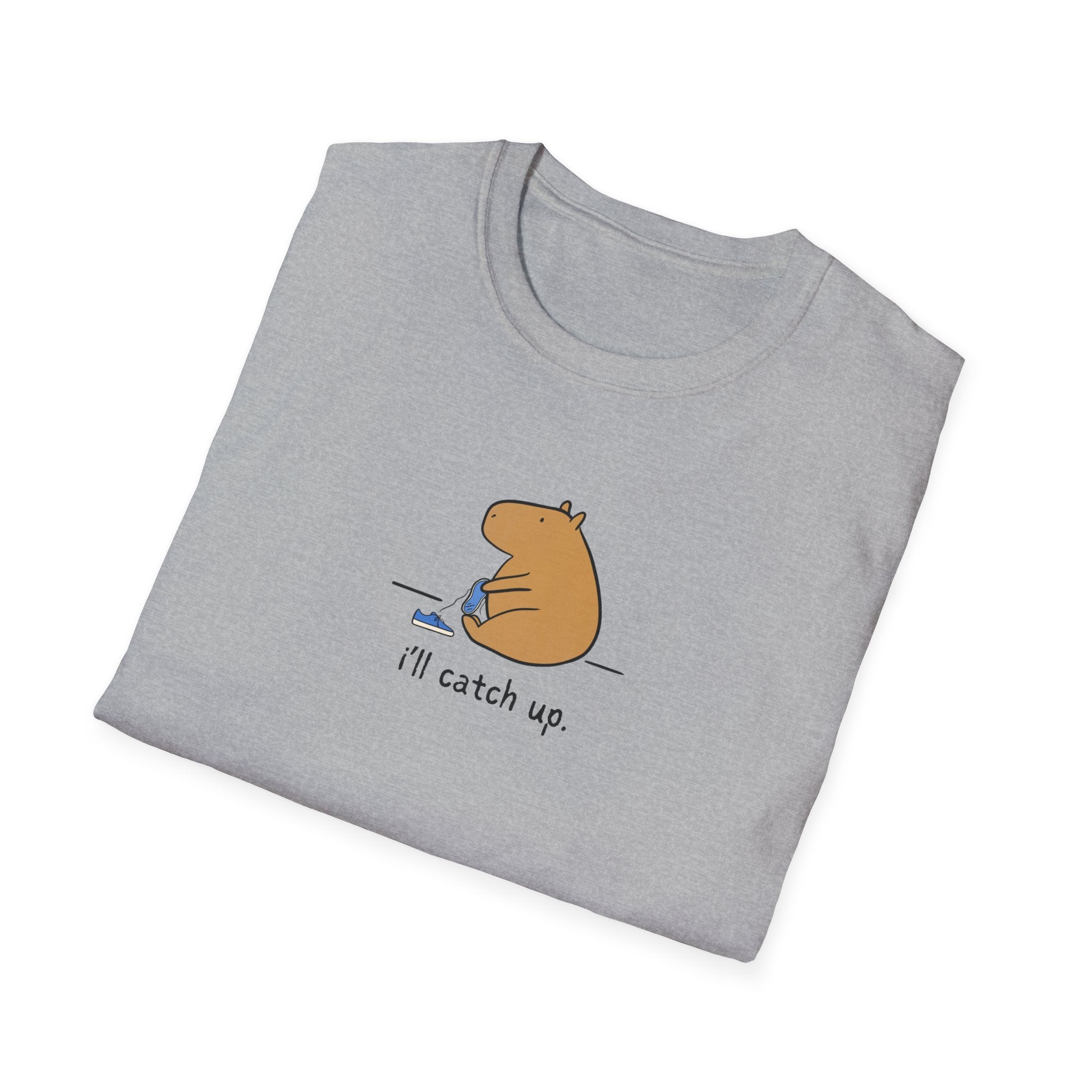 Capy Life grey softstyle t-shirt featuring a hand-drawn capybara sitting with a sneaker and text i'll catch up.