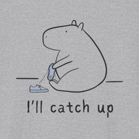 Capy Life grey softstyle t-shirt featuring a minimalist line drawing of a capybara tying its shoe with the text I'll catch up