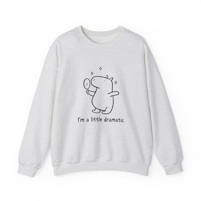 Capy Life heather grey crewneck sweatshirt featuring a cute line-art capybara holding a mirror with sparkles.