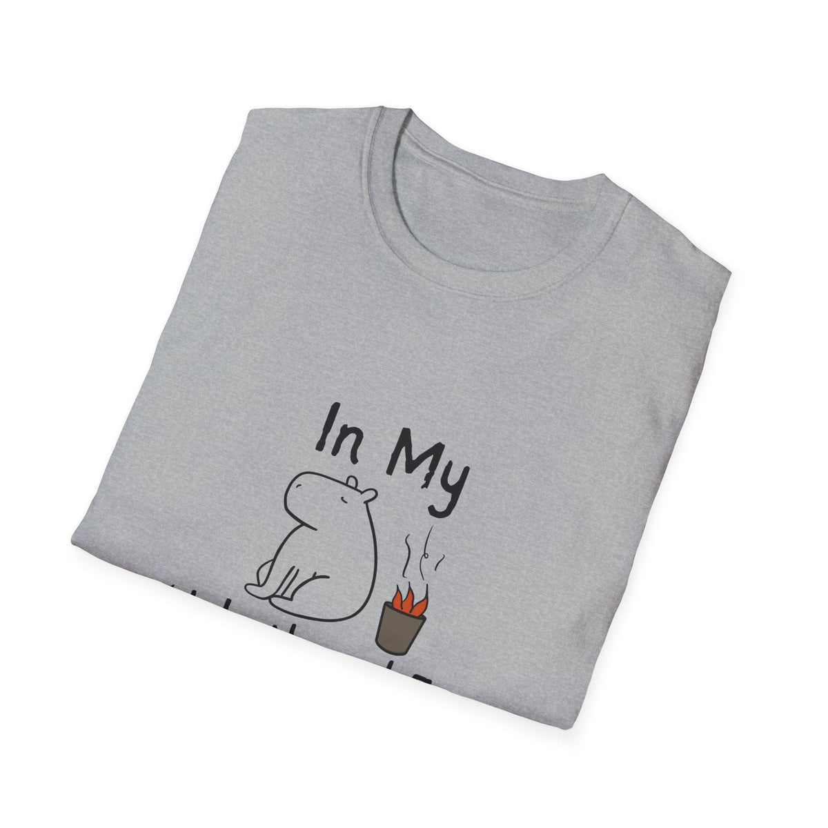 Capy Life grey softstyle t-shirt featuring a hand-drawn capybara sitting calmly next to a small fire.