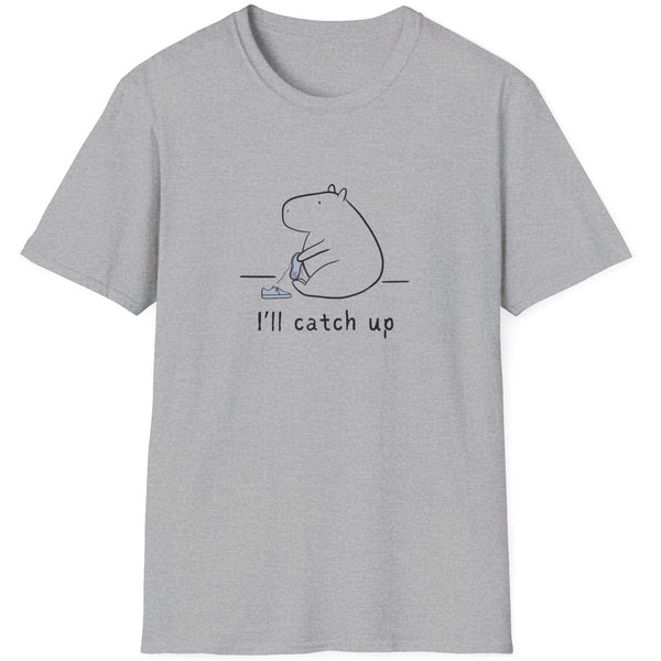 Capy Life grey softstyle t-shirt featuring a minimalist capybara illustration tying its shoe with text I'll catch up