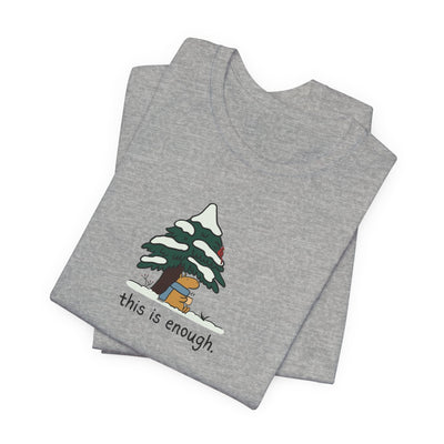 Capy Life grey graphic t-shirt featuring a hand-drawn capybara in a blue scarf under a snowy evergreen tree.