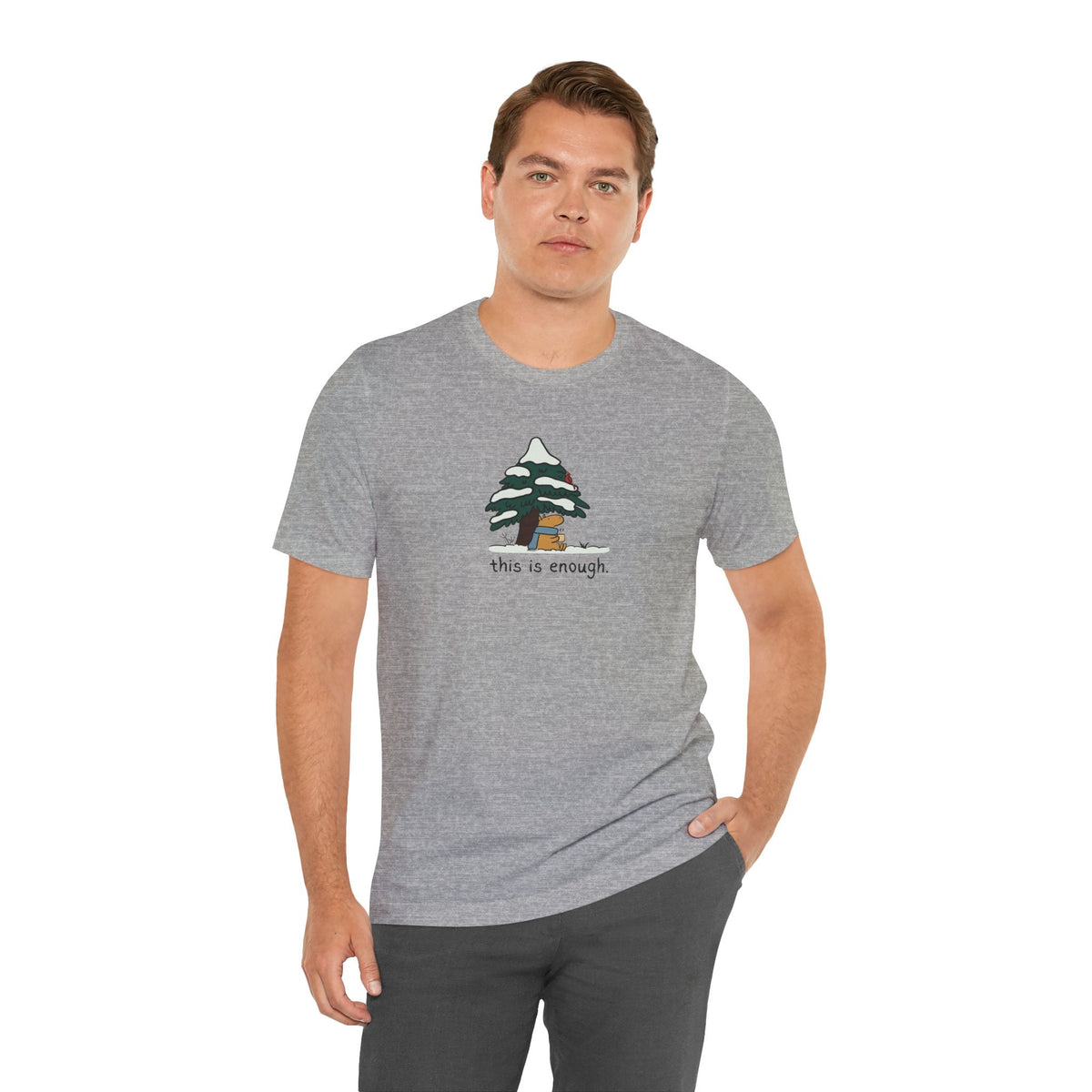 Capy Life grey short-sleeve t-shirt featuring a hand-drawn capybara under a snowy evergreen tree with text