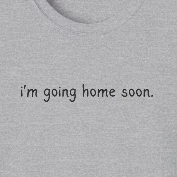 Capy Life grey softstyle t-shirt with minimal black text reading i'm going home soon in a simple font
