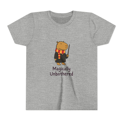 Capy Life youth grey cotton t-shirt featuring a cute wizard capybara with a wand and the text Magically Unbothered.