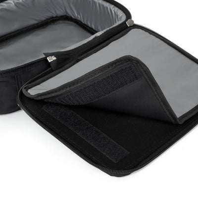Capy Life insulated black lunch box with grey interior lining and velcro closure detail
