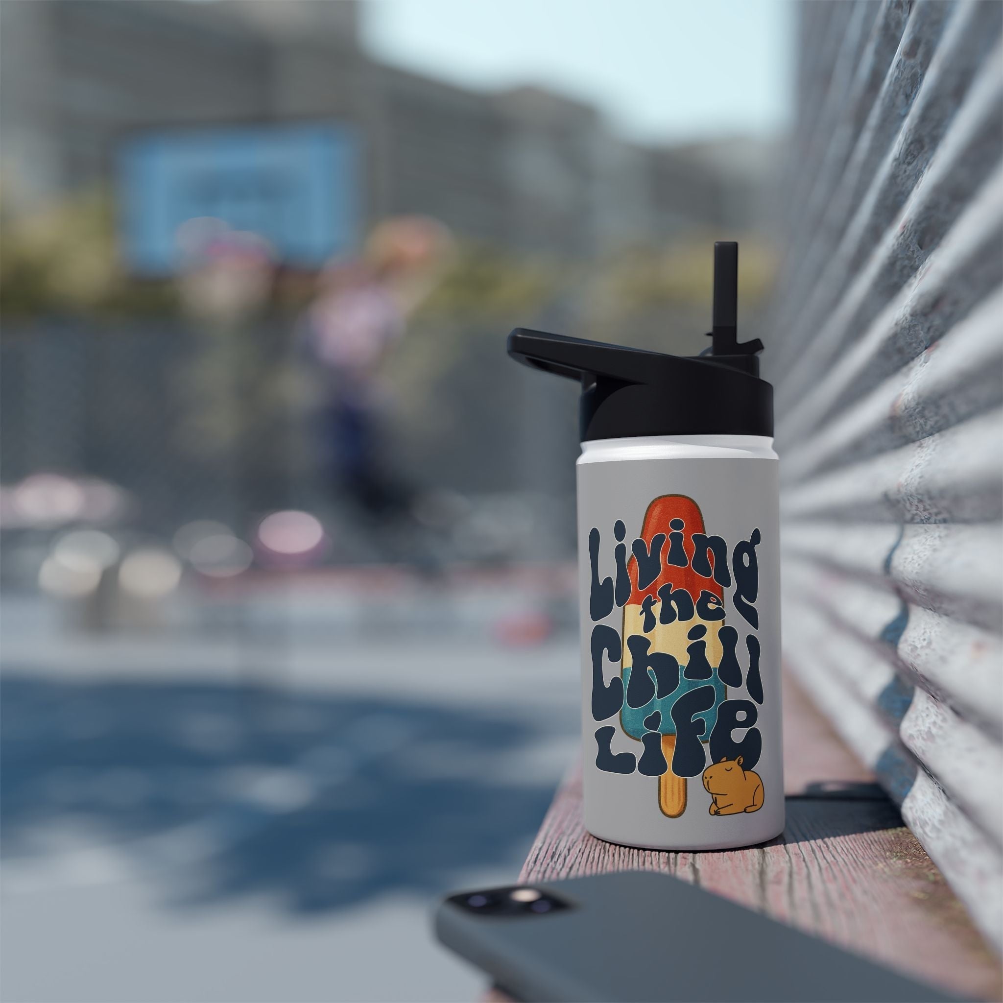 Capy Life insulated kids water bottle with retro popsicle design, groovy lettering, and a cute capybara illustration.