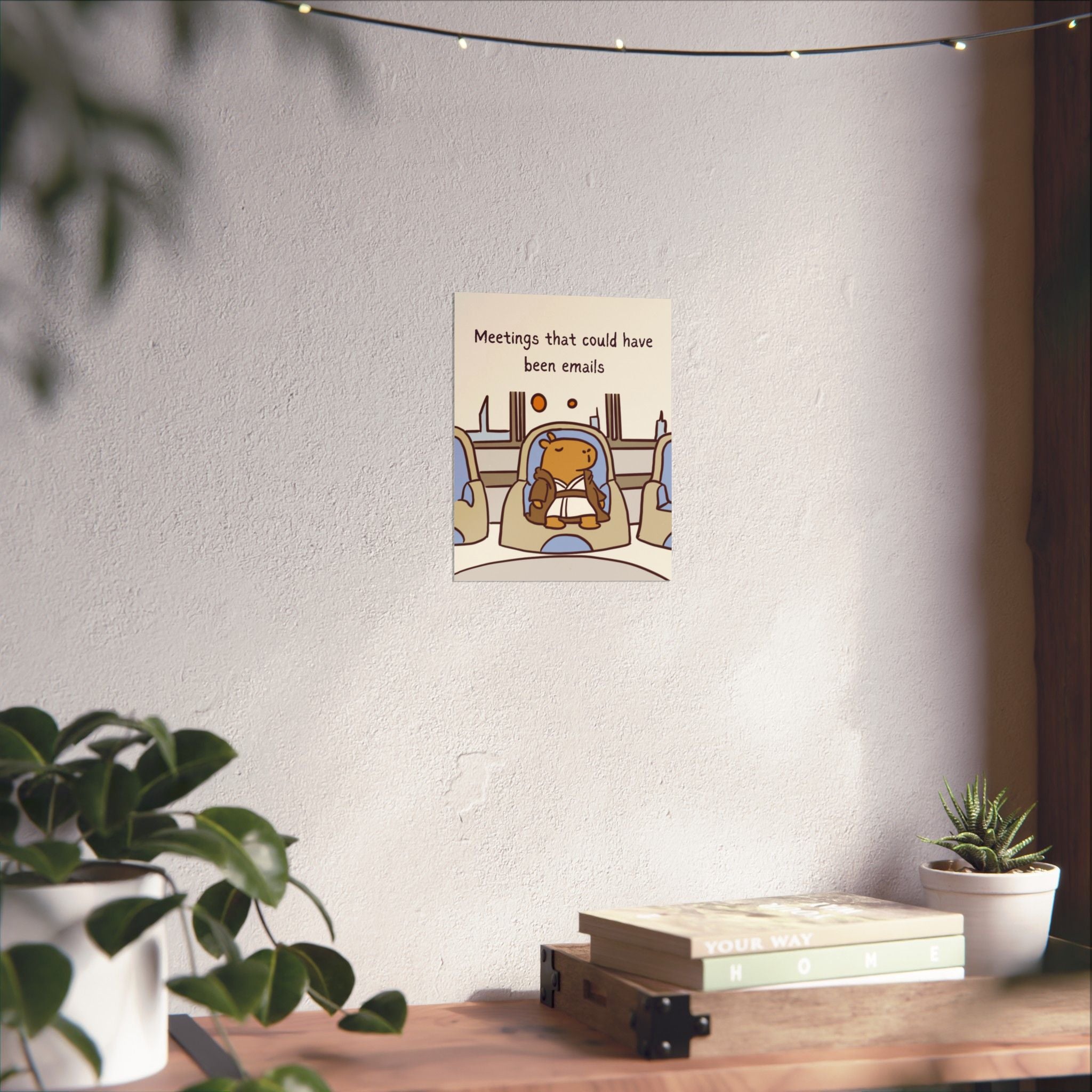 Capy Life wall art print featuring a Jedi capybara in a meeting, displayed on a white wall above a wooden desk.