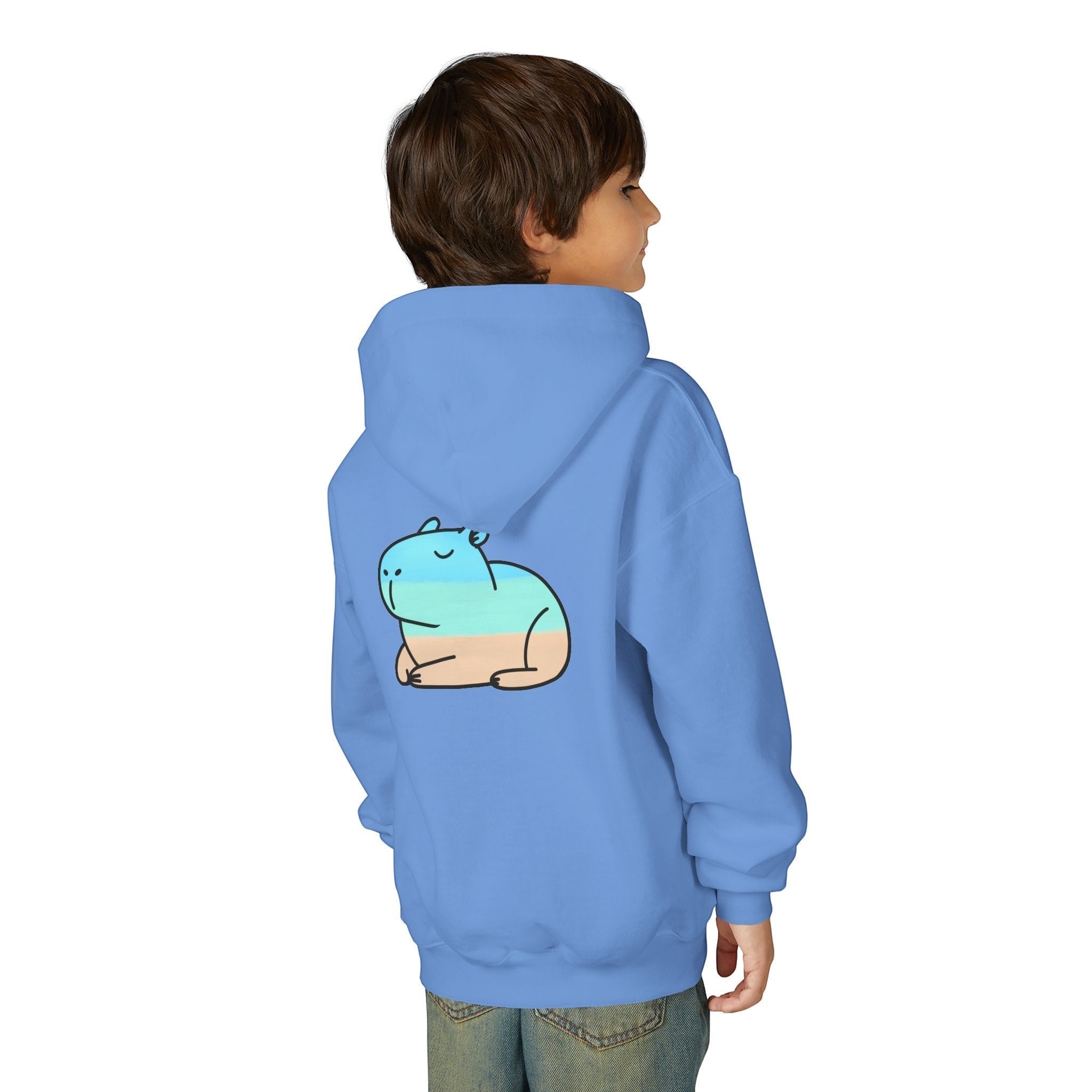 Capy Life kids blue pullover hoodie featuring a playful hand-painted capybara beach graphic on the back