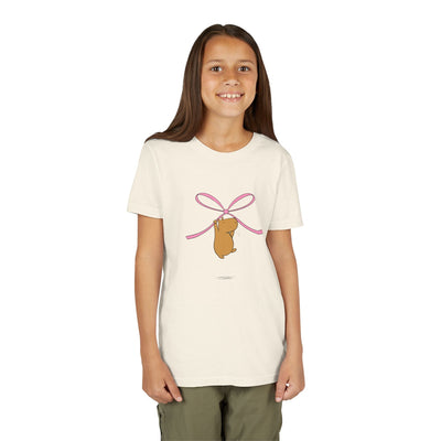 Capy Life kids cream t-shirt featuring a cute capybara hanging from a pink coquette bow graphic